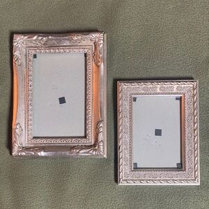 Set of 2 Melannco silver decorative frames. Sizes 
4 x 6 and 3 1/2 x 5